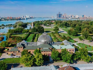 Aerial view of the Detroit Botanical Garden, showcasing the glasshouses and surrounding parkland....