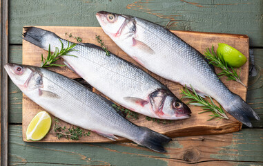 Raw sea bass fish photography . Top view