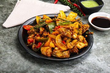 Vietnamese cuisine - fried frog with vegetables
