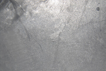 Texture of ice with cracks. Structure of frozen water in section