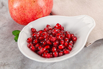 Ripe sweet red pomegranate seeds