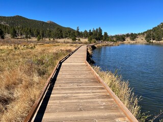 Wooden walkway along the Lily lake, Estes Park, Colorado