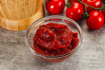 Red tomato paste in the bowl