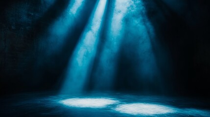 Obraz premium A powerful beam of light focuses on the center stage in a dark setting, creating a dramatic, high-contrast composition