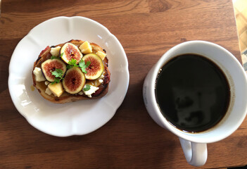 Coffee with figs, honey and cheese bruschetta
