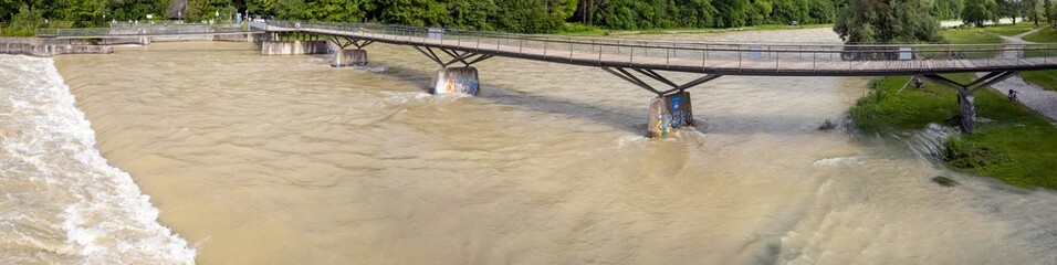 Summer River Isar in Munich Flood Panoramic View from above. Current and lots of water City and...