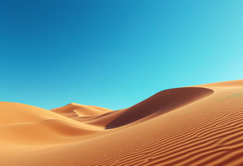 Sand dunes in a desert landscape under a clear blue sky