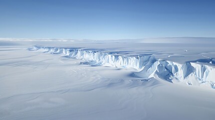 Obraz premium Massive ice shelf stretches across the snowy landscape as an educational visual for science.