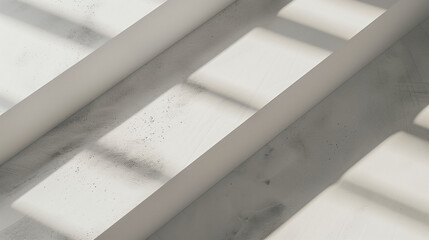 Obraz premium Closeup of empty white rectangle poster mockups lying diagonally with soft shadow on neutral light grey concrete background. Flat lay, top view. Open composition. 