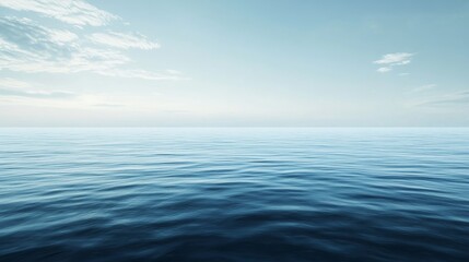 Fototapeta premium Serene ocean view with gentle waves under a clear sky.