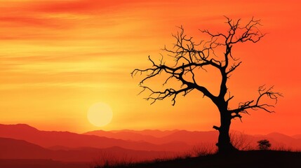 Naklejka premium Silhouette of a dead tree against a vibrant sunset sky over distant mountains creating a dramatic natural landscape scene.