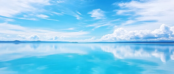 Fototapeta premium Calm waters reflecting clouds scenic lake nature photography tranquil environment wide-angle view peaceful serenity