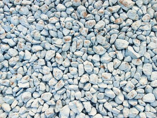 Abstract background of neatly arranged pebbles
