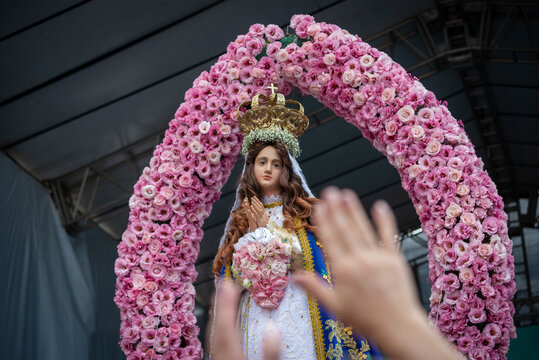 Catholic faithful are seen raising their hands to Our Lady of Conception of the Beach in the city of Salvador, Bahia.