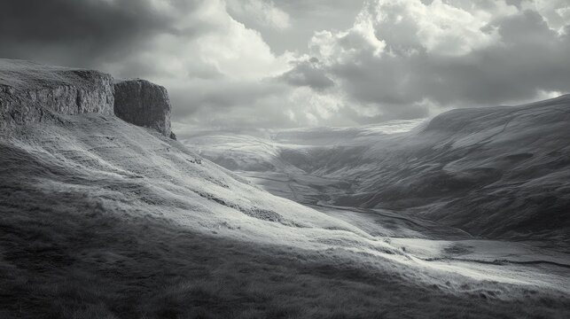Stainforth Scar dramatic landscape in monochrome showcasing valleys mountains and moody skies near Settle in the Yorkshire Dales National Park