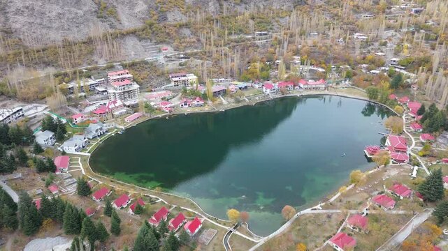 Aerial top view of heart love shape pond river lake in Karakoram high mountain hills. Nature landscape background, Skardu,Gilgit, Pakistan. Travel on holiday vacation.