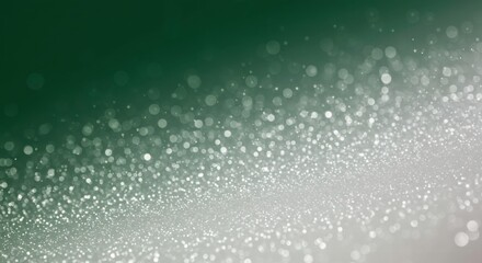 Obraz premium Abstract Emerald Bokeh: A mesmerizing blend of emerald green and soft white, creating an abstract bokeh effect. The soft, out-of-focus lights evoke a sense of dreamlike wonder.