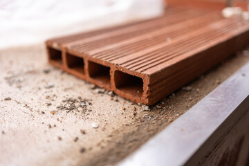 Detail of flat brick for the construction of walls in masonry work.