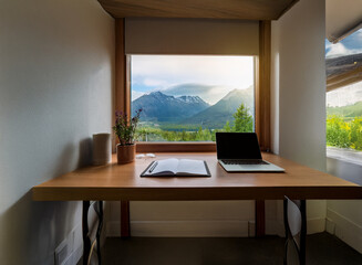 Fototapeta premium Serene home office space with a stunning mountain view. Ideal for remote work, offering tranquility and inspiration.