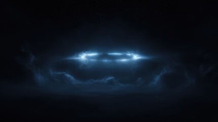 A dark sky with a bright blue object in the center