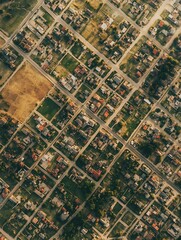 Fototapeta premium Overhead Capture of Residential Neighborhood Showing Gridlike Street Layout : Generative AI