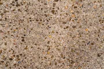 Concrete texture with fine gravel in old concrete as background.