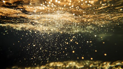 Stunning Underwater Scene with Sunlight Reflections and Bubbles Creating an Enchanting Golden Atmosphere in a Natural Water Environment