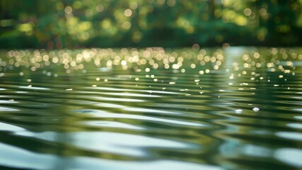 Defocused shot of a peaceful river reflecting the excitement of the fishing derby.
