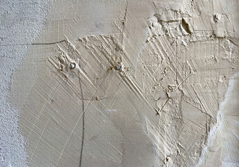Fragment of an old wall with cracks and holes. Structure of an old wall. Architectural concept for...