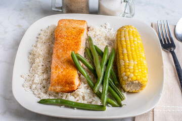 baked seasoned  with rice  and green beans