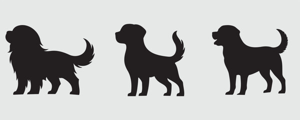 Set of three black dog silhouettes in distinct poses on a gray background