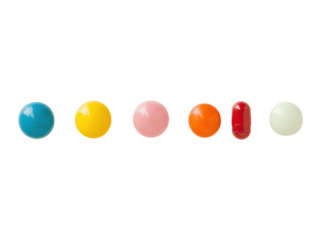 A small set of assorted pills and capsules, arranged in a row with different colors and shapes, isolated on a white background for a clean medical look