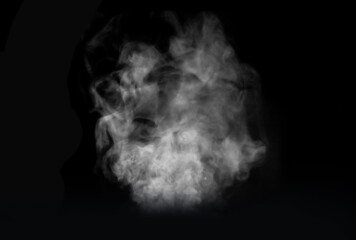 Abstract white fog or white smoke evaporates turns, Image white characteristic smoke lumps on black...