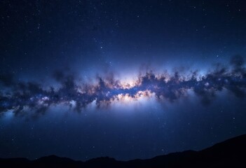 Obraz premium Milky Way Galaxy over Silhouetted Mountains 