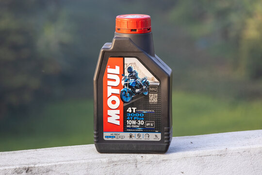Motul 3000 4T Plus 10W-30 Premium Mineral 4-stroke Engine Oil. Captured on an outdoor wall in Kishoreganj, Bangladesh, on December 14, 2024.