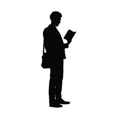 Silhouette of a person reading a book