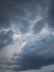 Clouds floating in blue sky.