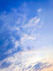 Clouds floating in blue sky.
