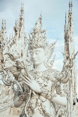 Ornate white statue at Wat Rong Khun, Thailand.