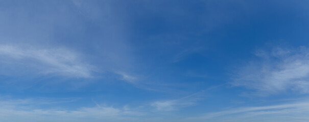 Blue sky and beautiful clouds shape. Image for background and wallpaper.Blue sky with clouds background.Sky daylight. Natural sky composition. Element of design.