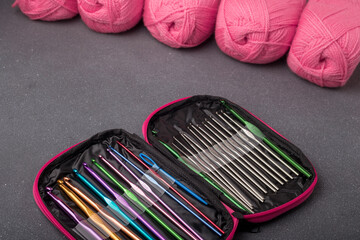 Crochet tools kit, set of crocheting hooks in a case. Organizer with equipment for creative...