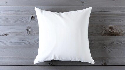Flat lay mockup of white square cushion on a grey wooden background 