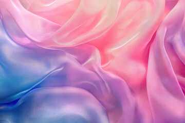 Fototapeta premium Soft silk fabric in shades of pink, blue, and lavender flows gracefully, creating a smooth and elegant backdrop that adds a touch of sophistication to any setting.