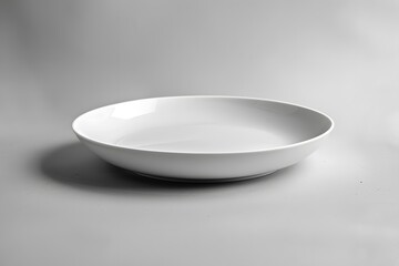 Elegant White Plate on Gray Background for Culinary Presentation