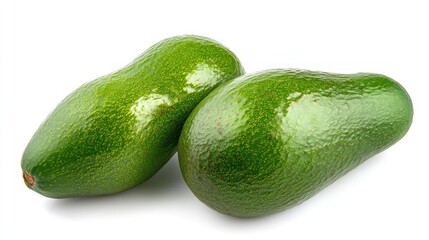 Two ripe avocados isolated on white background.