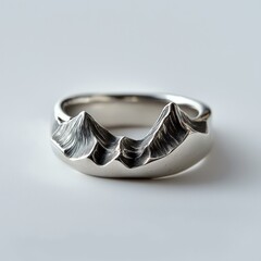 Silver ring with mountain range design in polished finish
