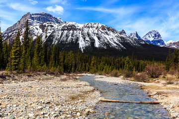 A mountain range with a river running through it