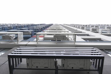 Fototapeta premium Perspective view of modern building facade with AC units.