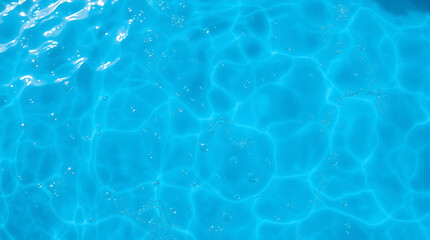 Obraz premium transparent Blue Water with Ripples, Splashes, Bubbles, and Sunlit Waves – Abstract Summer Banner Background, water texture, abstract background, copy space