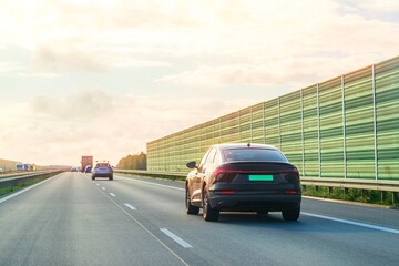 Fototapeta premium High-performance SUV on suburban road